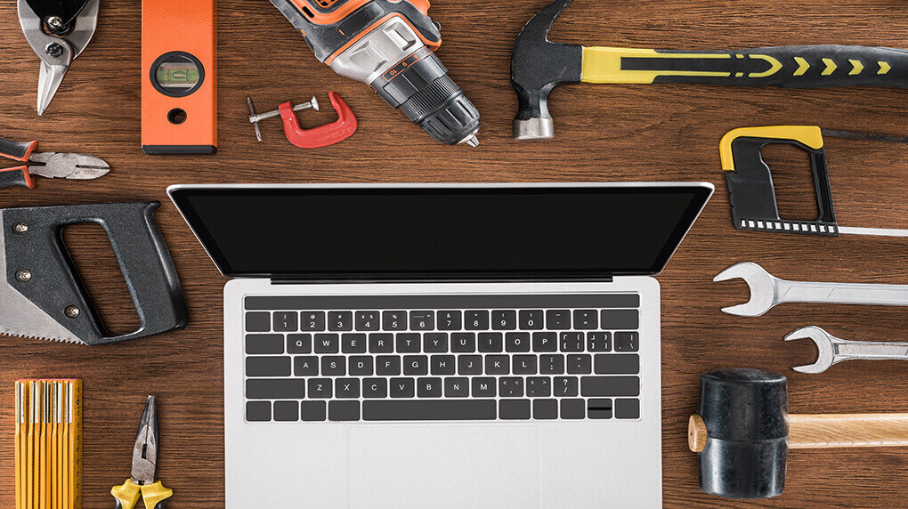 Reasons why - laptop surrounded by tools (1)